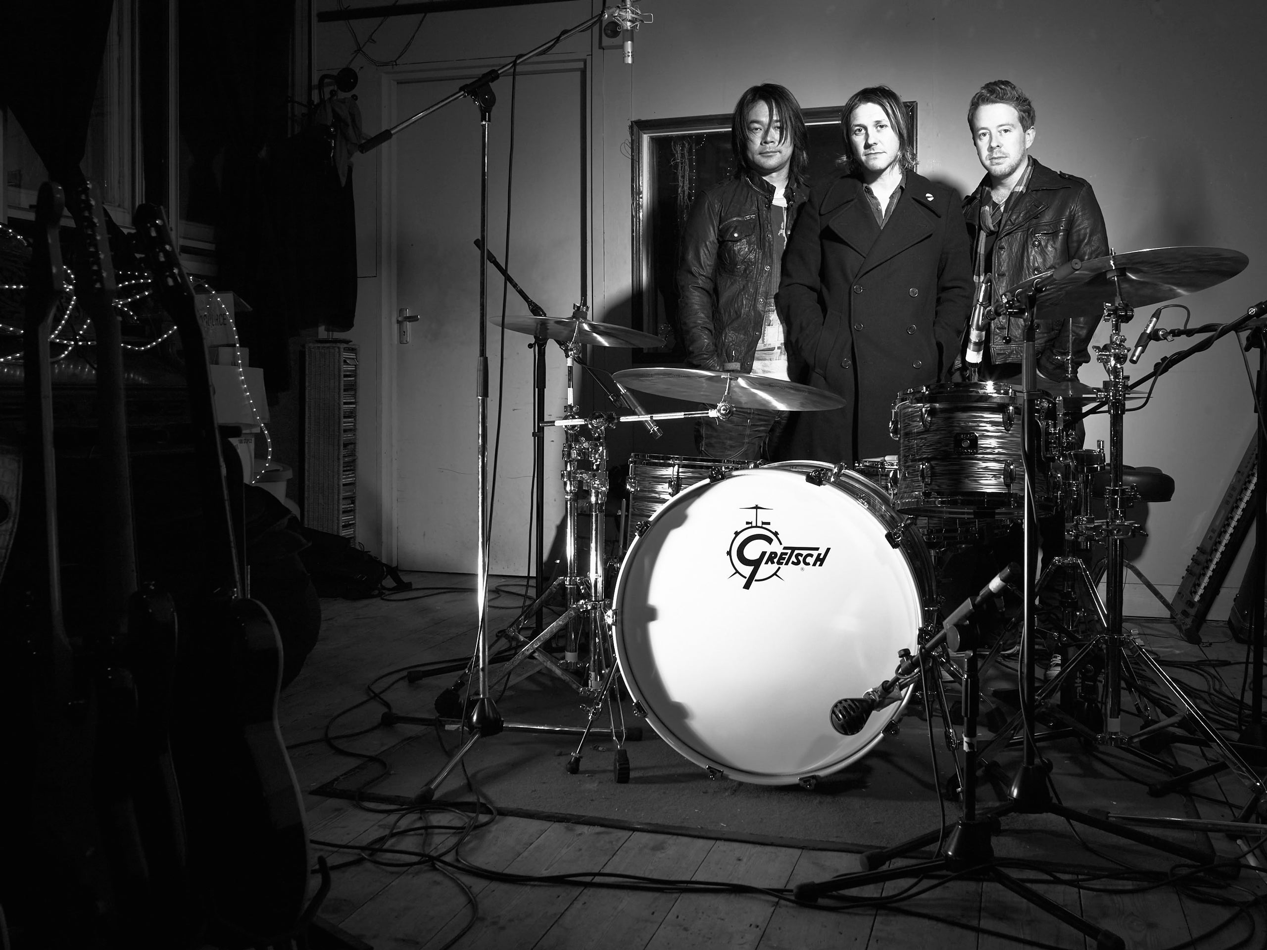 Location portrait shoot of UK rock band Renegades (Feeder) fro Gretsch Drums